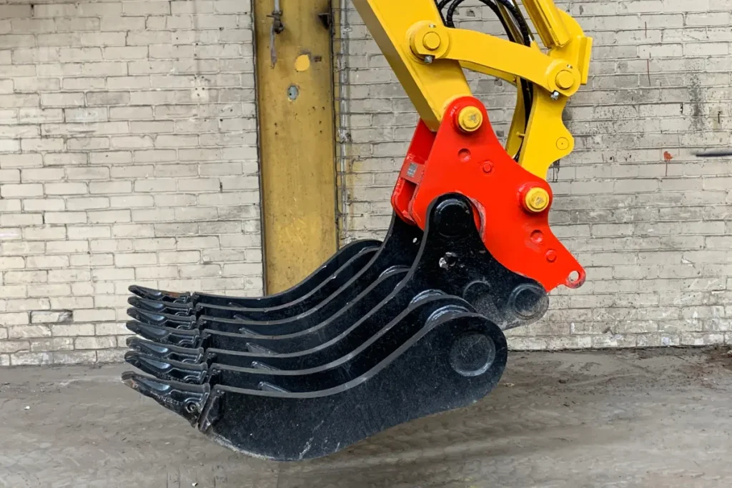 Excavator power rakes